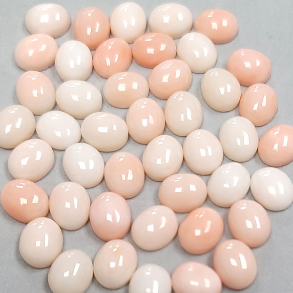 09X11MM OVAL CABOCHON  NATURAL ANGLE SKIN CORAL
